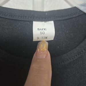 Kids Black Matching Set. Beautiful And Stylish Kitty Shirt With Some Shorts.